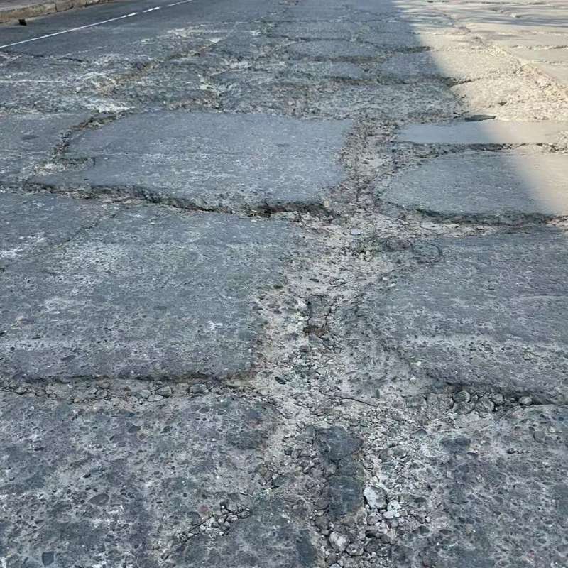北塔路面起砂露石子修补料